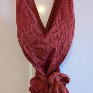 Women's NWT one piece bathing suit in rust color and size medium 8-10.